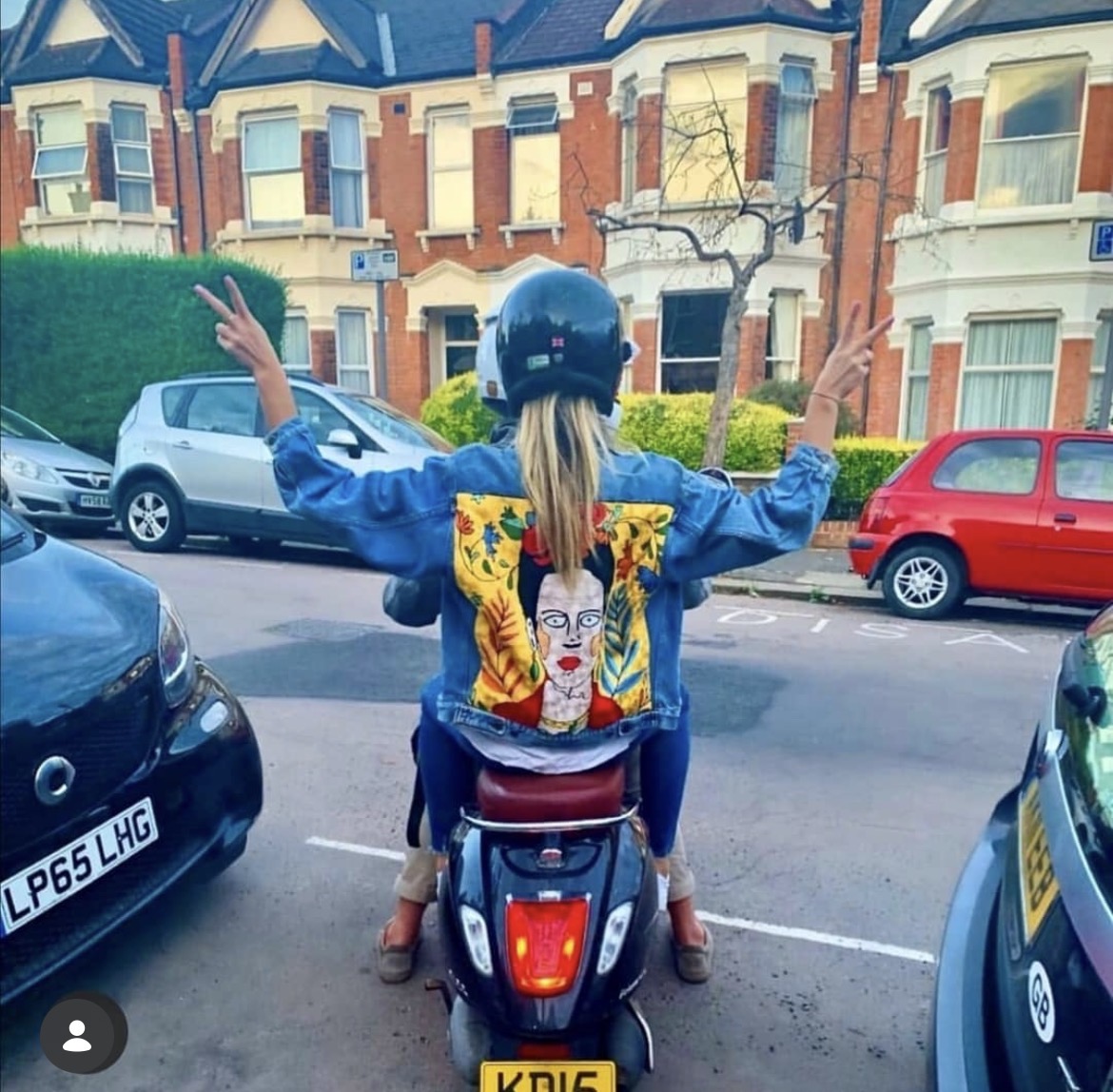 Frida on the Move — Light wash trucker, Frida panel. Worn out of the shop and straight onto the road.